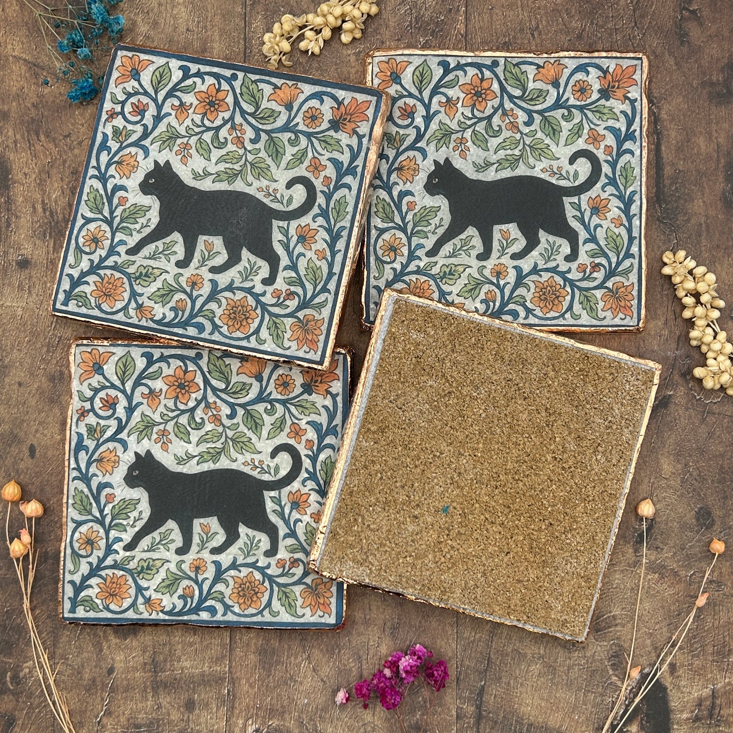 Set of four elegant black cat coasters with copper edging, William Morris