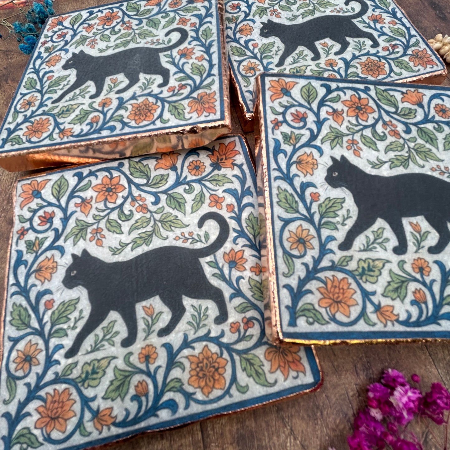 Set of four elegant black cat coasters with copper edging, William Morris